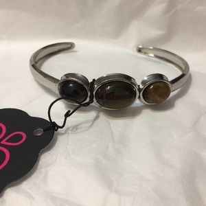 Silver cuff with Tiger's Eye gems